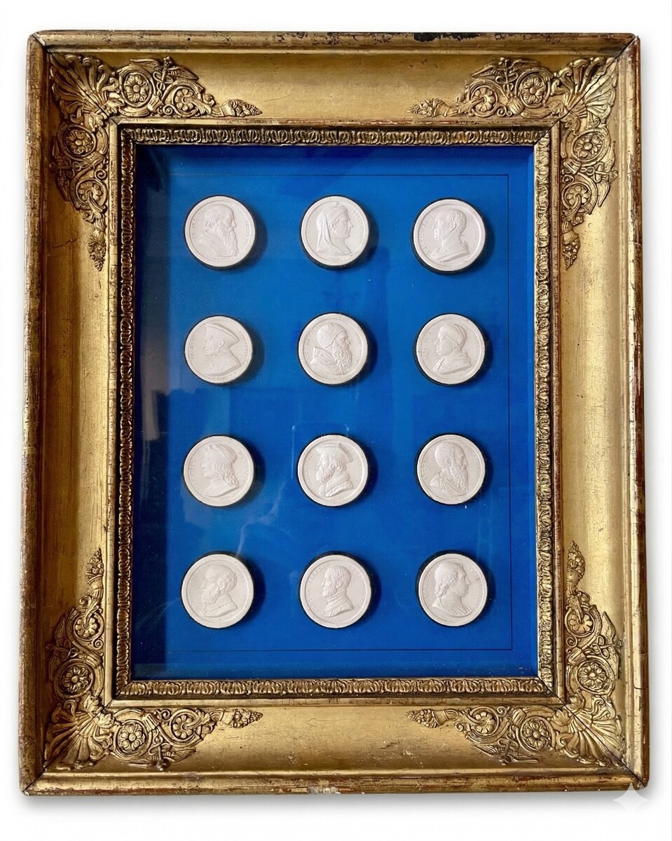 Set of twelve signed medallions