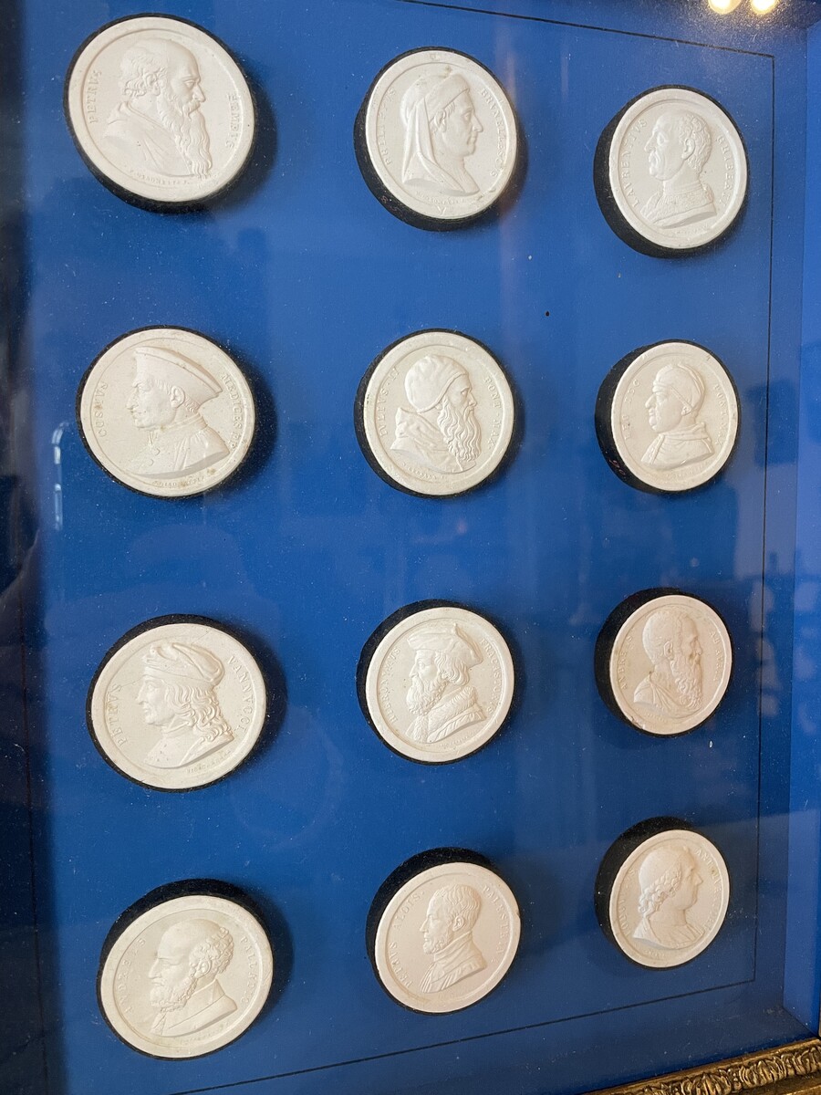 Set of twelve signed medallions, each decorated with a profile of an Italian Renaissance man