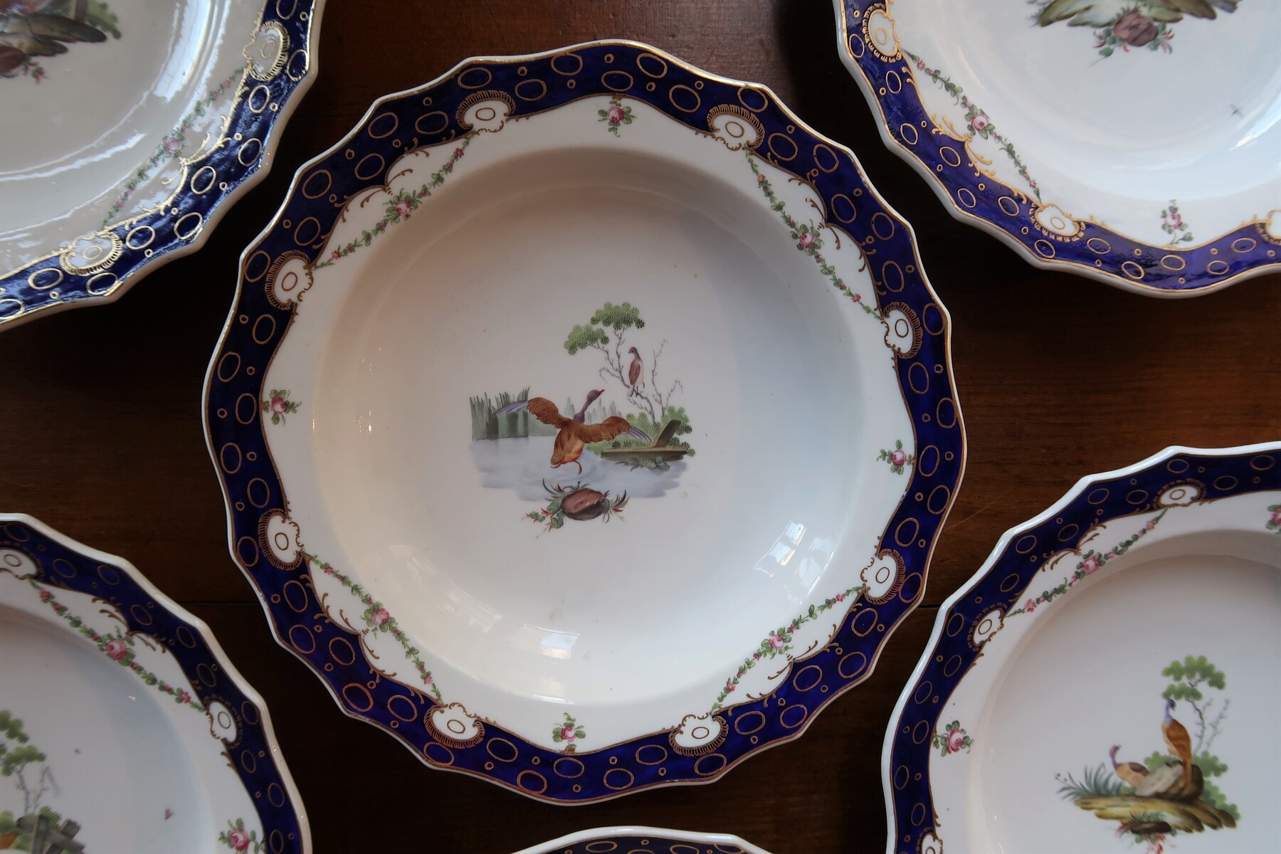 Six Tournai soup plates - painted in Den Haag