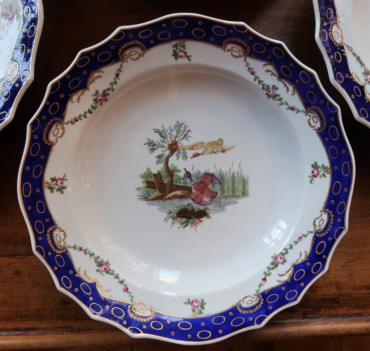 Six Tournai soup plates - painted in Den Haag